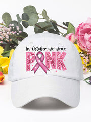 En octobre, nous portons des chapeaux neutres rose cancer du sein