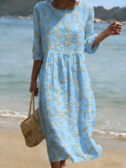 Robe mi-longue en mélange de lin à col rond et imprimé plantes et fleurs pour femme
