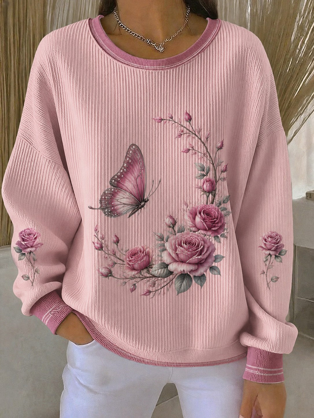 Sweat-shirt pour femmes à imprimé fleurs sur la poitrine