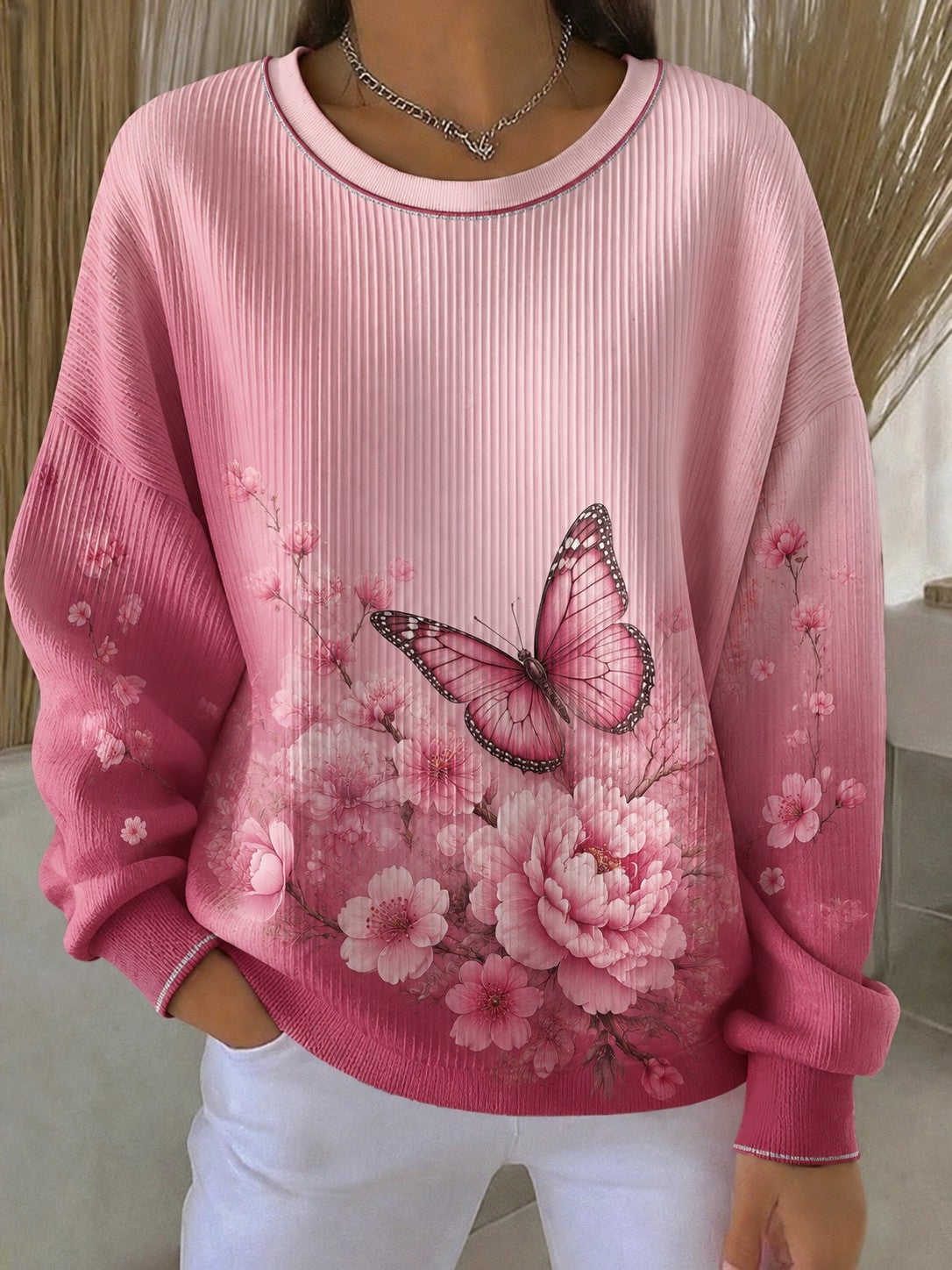 Sweat-shirt pour femmes à imprimé fleurs sur la poitrine