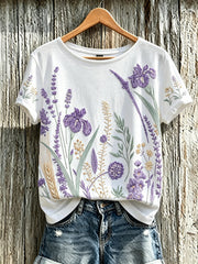 T-shirt décontracté pour femme à imprimé fleurs violette sur fond végétal